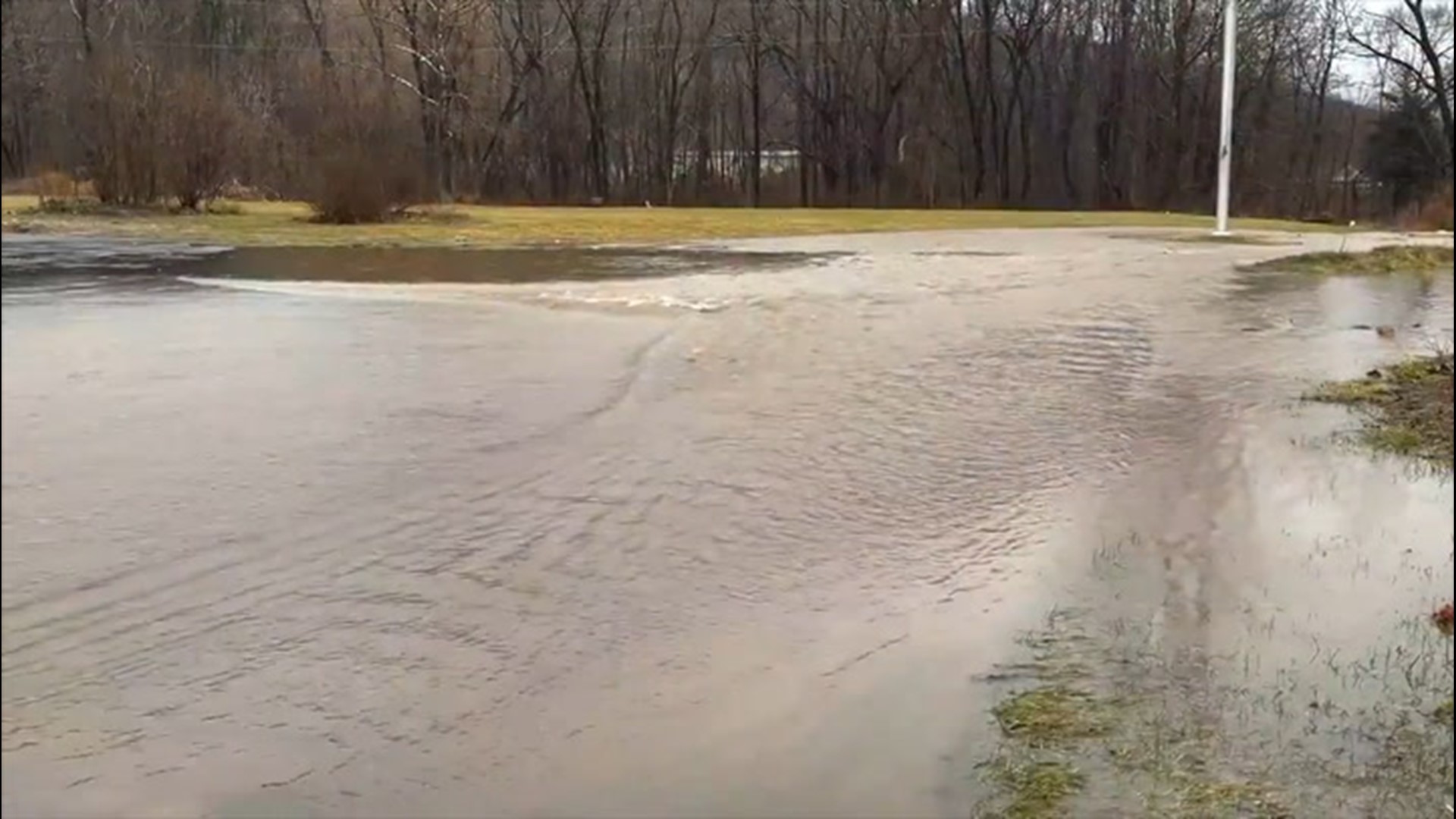 A parking lot was flooded and streams swelled in Cresaptown, Maryland, on Feb. 28, as heavy rain fell on the region.