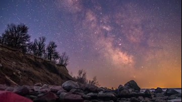 Night sky pops with color in time-lapse video over Canada