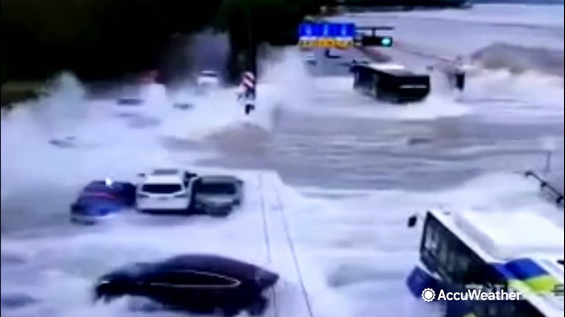 High tide waves crashed over a bank and swept away several cars along a roadway in Hangzhou, China on Sept. 21.