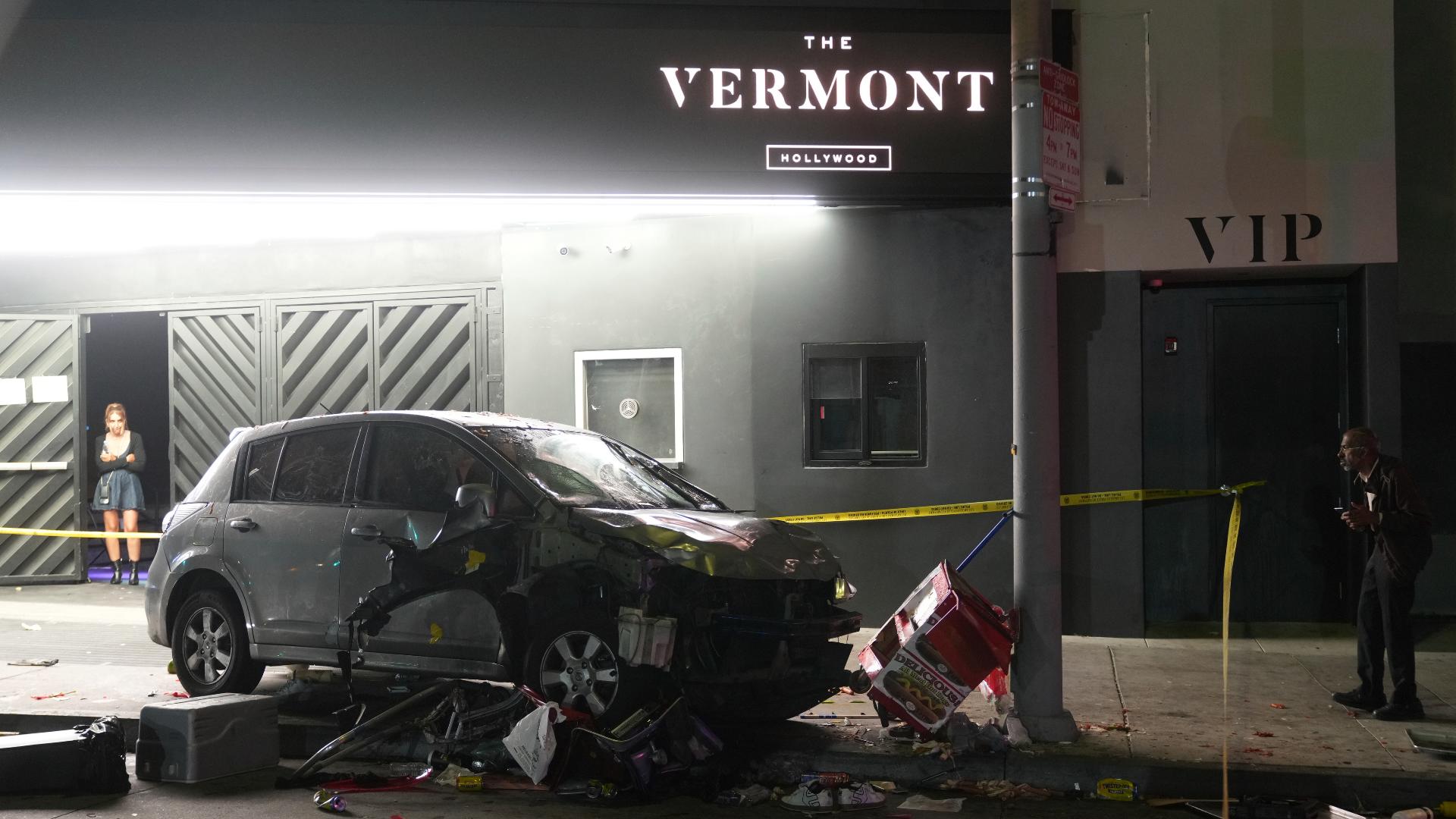A vehicle rammed into a crowd of people waiting to enter a nightclub along a busy boulevard in Los Angeles early Saturday, injuring 30 people.