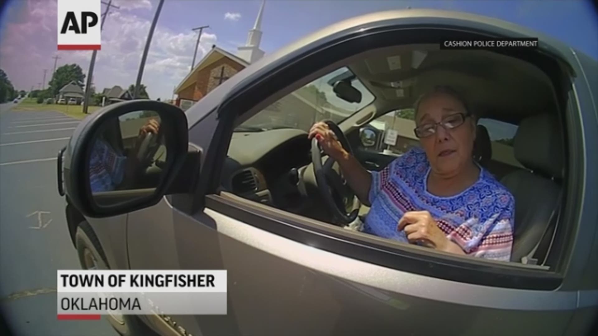 Body camera video shows a police officer using a stun gun on a 65-year-old Oklahoma woman. She was stopped for a broken taillight.