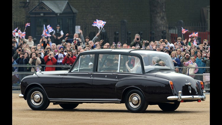 The British have always understood that a royal wedding is about more than tradition and pageantry. It's also a chance to show off United Kingdom industry, especially its cars. If the 2011 wedding of Kate Middleton and Prince William is any indication, the nuptials between Meghan Markle and Prince Harry will be a chance to display some of the very best out of the royal garage. That means storied British names like Rolls-Royce, Bentley, Jaguar, Land Rover and -if the last wedding is any indication - a fun Aston Martin sports car. The convertible belongs to Harry's dad, Charles, the Prince of Wales. Of course, these days the world's auto industry is more complicated. Rolls-Royce is owned by Germany's BMW. Bentley is part of Volkswagen. And Jaguar Land Rover is part of India's Tata Motors. In everyday life, Harry has been seen driving other European brands in recent years, like a German Audi. Kate Middleton waves as she travels in a Rolls Royce Phantom VI, accompanied by her father Michael Middleton to Westminster Abbey in London for her wedding to Britain's Prince William on April 29, 2011.