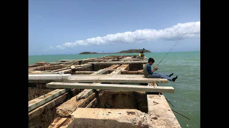 Splintered piers, federal denials, blue tarps Puerto Rico