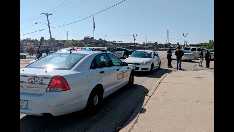 Dixon Ill. Officials say an officer has shot and wounded a gunman at a northern Illinois high school