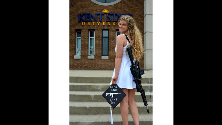 Photo of college graduate wearing AR-10 rifle goes viral