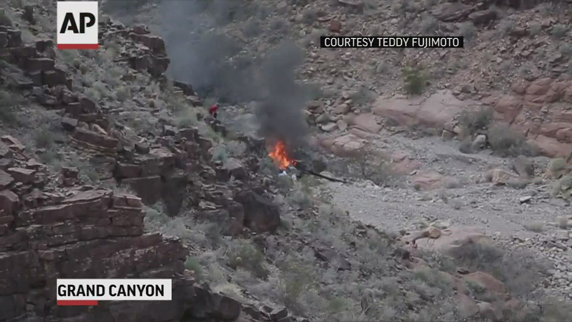 Four survivors of a deadly tour helicopter crash onto the jagged rocks of the Grand Canyon were being treated at a Nevada hospital on Sunday while crews tackled difficult terrain in a very remote area to try to recover the bodies of three other people.