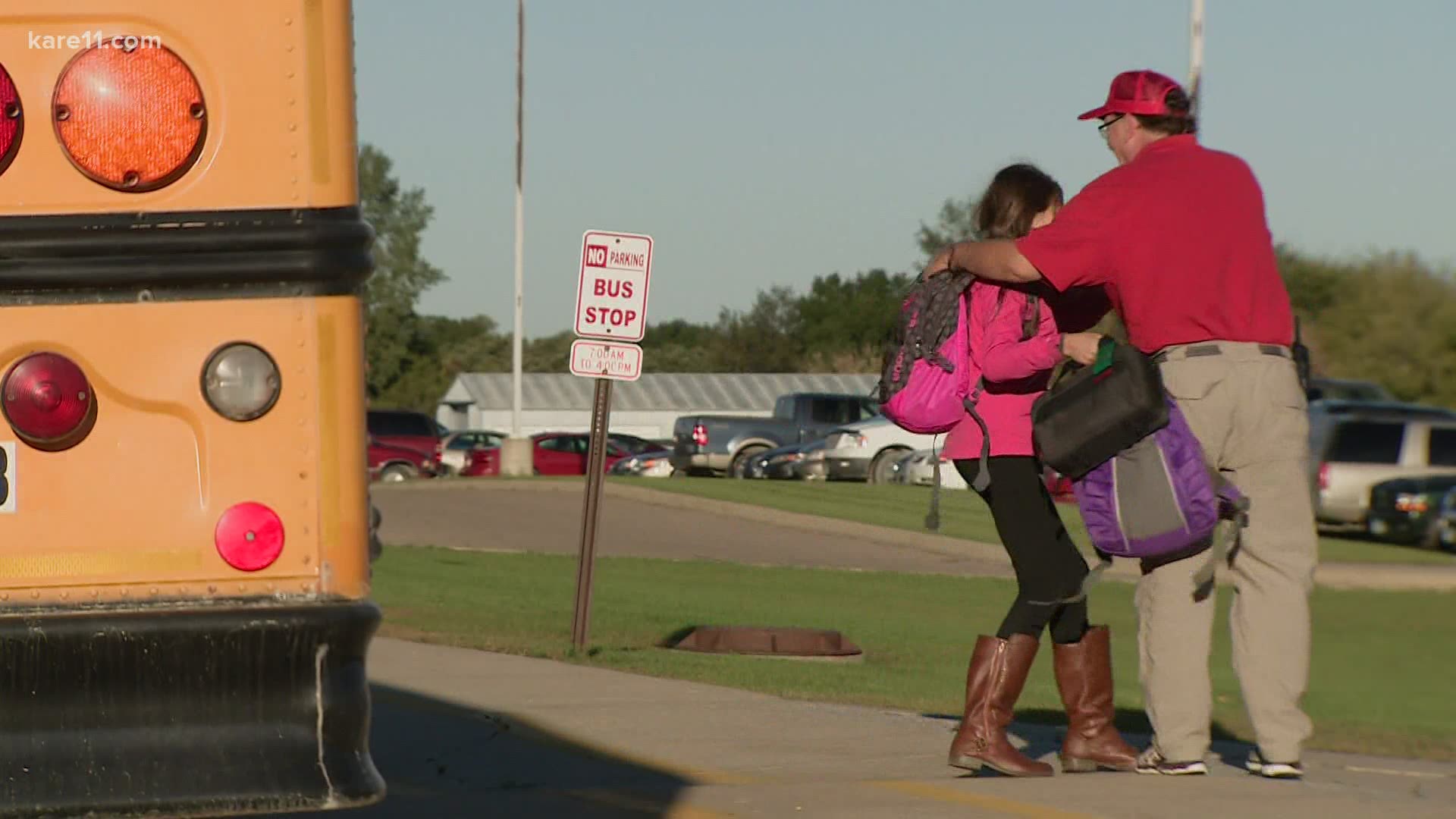 Every school day, rain or shine, Jon Held can be found in his familiar red cap, warmly welcoming students.