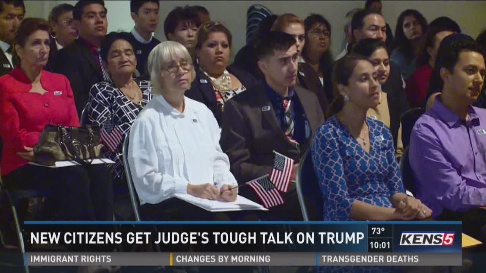 New citizens get judge's tough talk on Trump