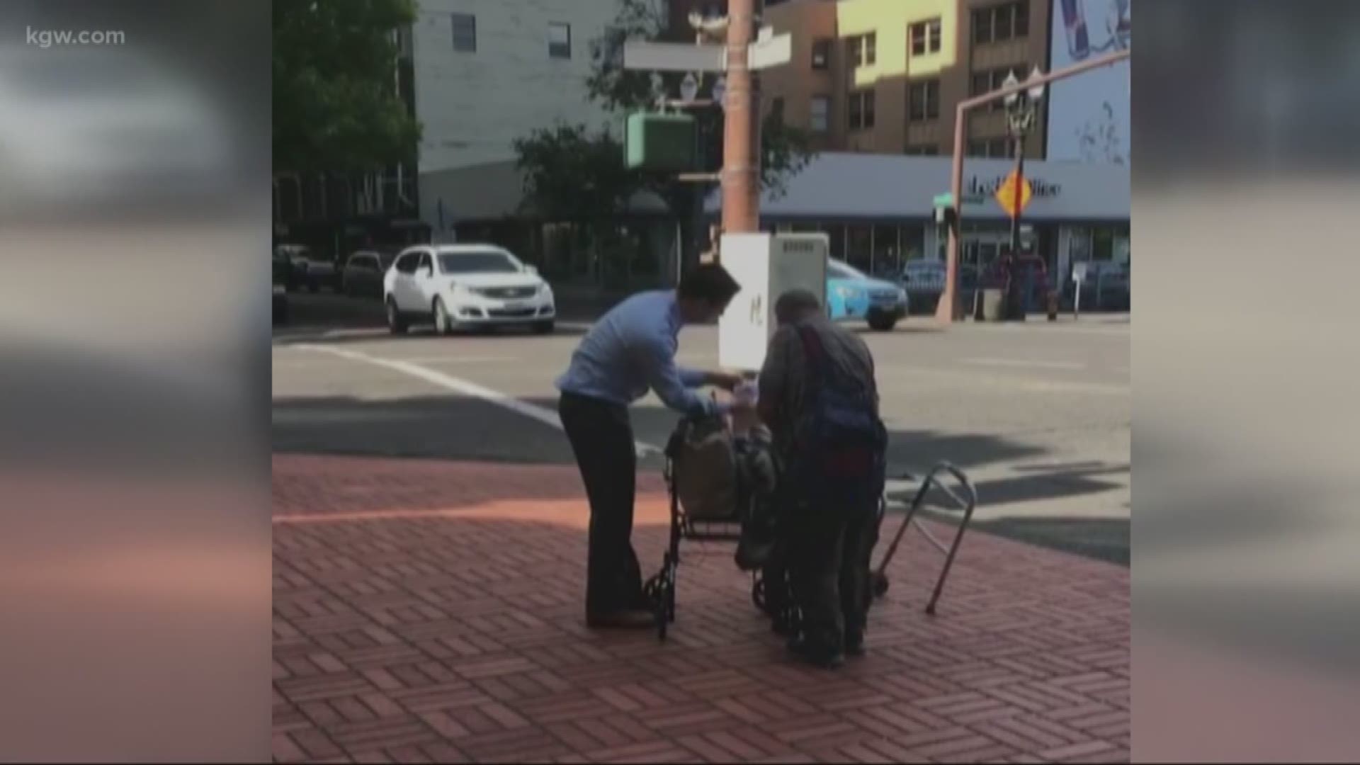 Man helps stranger in act or kindness