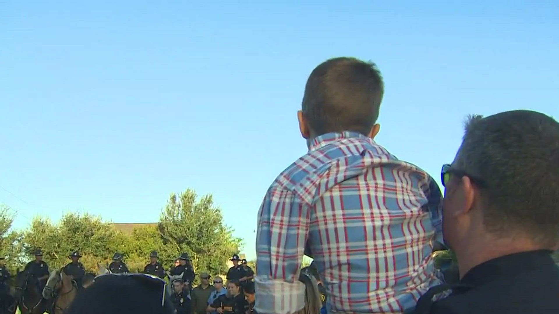 The son of a fallen HPD officer was escorted to his first day of kindergarten by hundreds of police officers.
