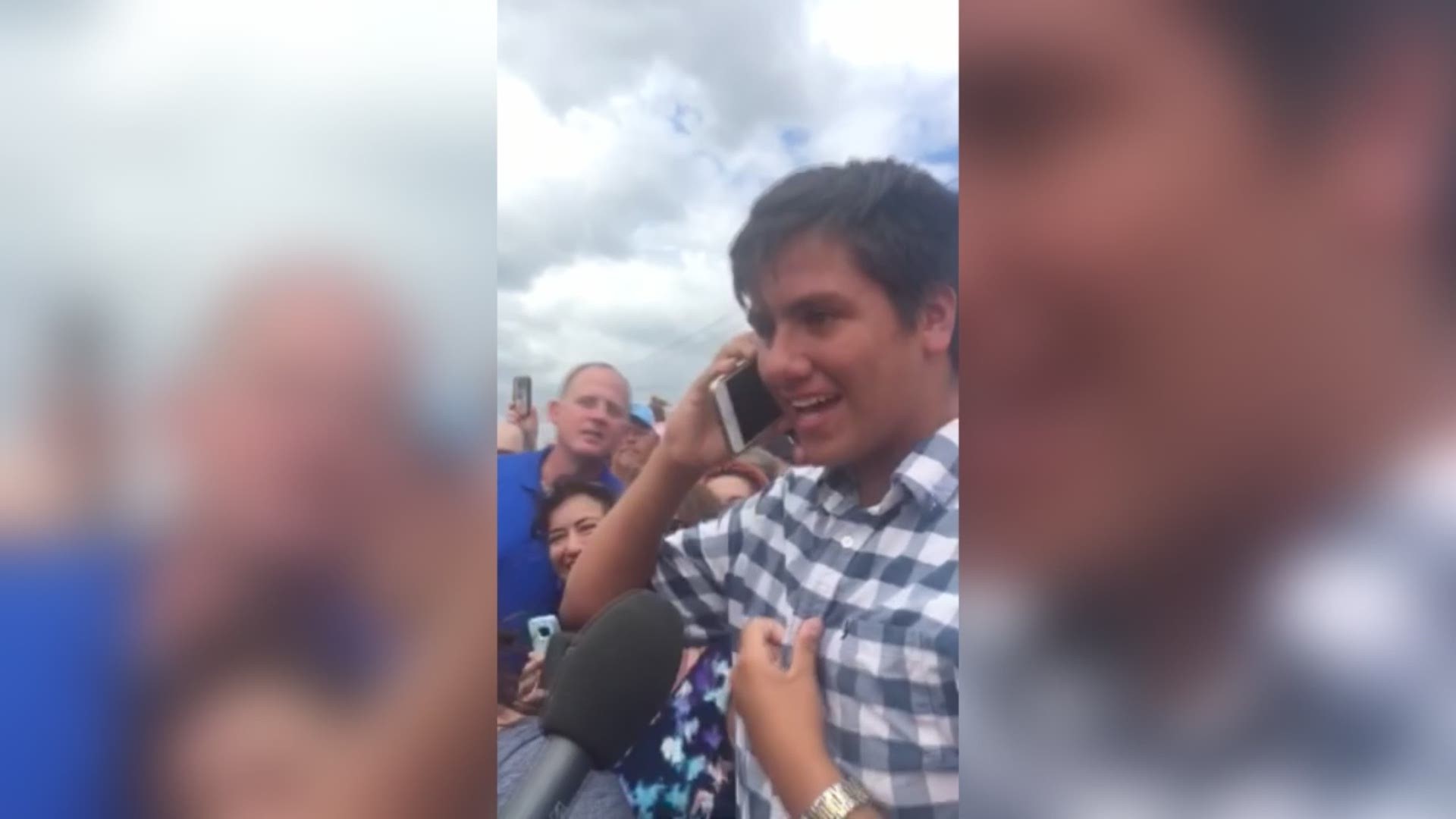 A young man was overcome with excitement as President Donald Trump took the flag he was holding and waved it in front of a crowd gathered outside the Annaville Volunteer Fire Department station Tuesday.