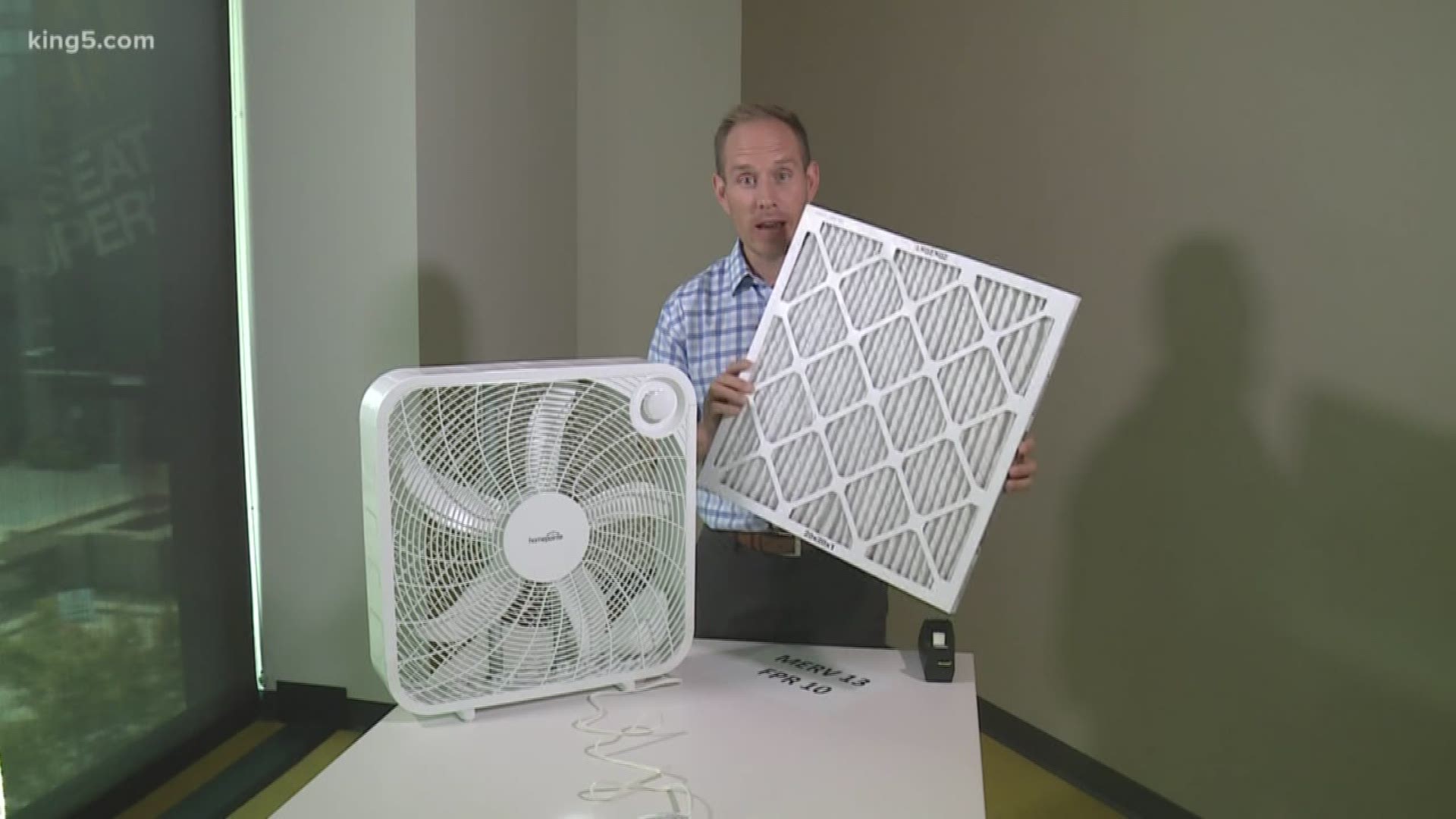 KING 5's Ted Land demonstrates assembling a do-it-yourself air filter.
