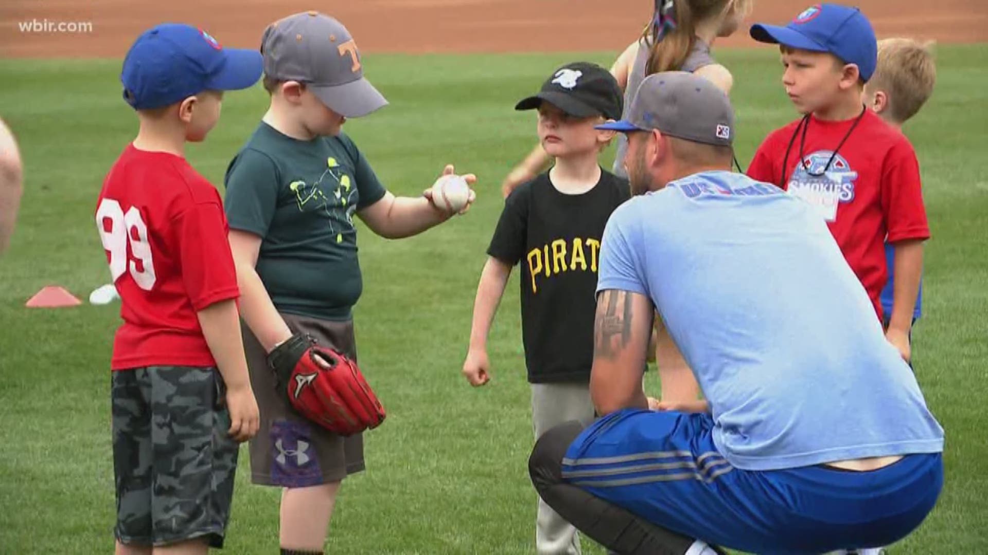 Tennessee Smokies baseball players taught kids the fundamentals before their game Sunday.