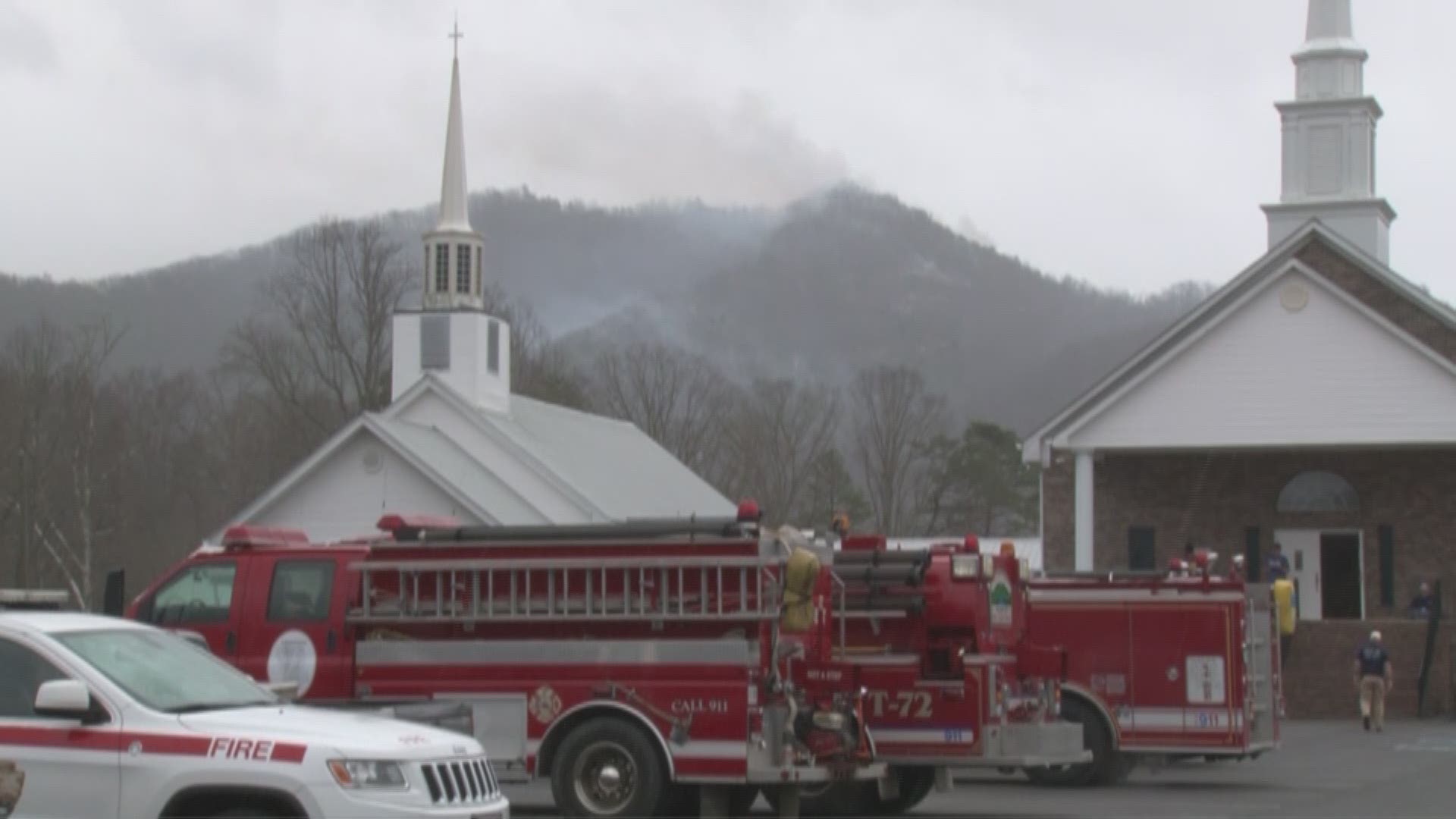 Officials say a brush fire in Wears Valley is 100% contained.