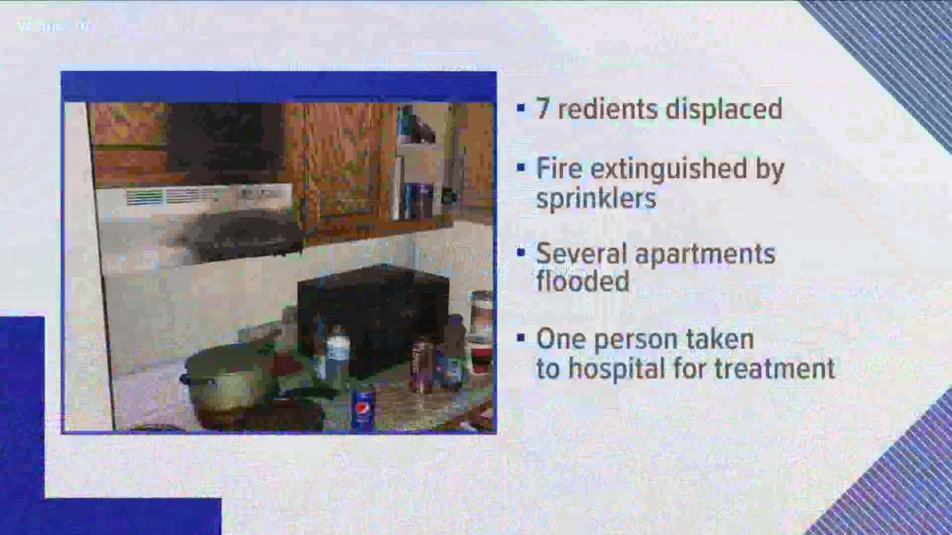 One 60-year-old woman was taken to the hospital for smoke inhalation.