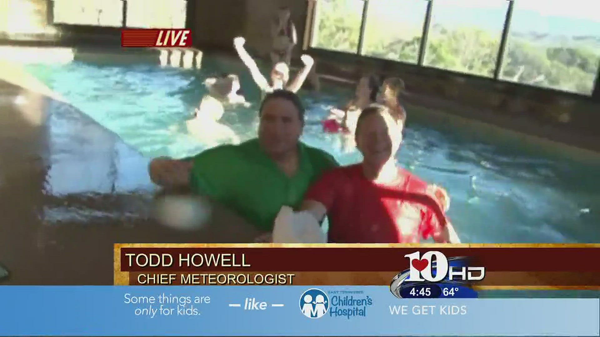 As Meteorologist Todd Howell was delivering the forecast in a swimming pool, Russell Biven surprised him by jumping in with him!