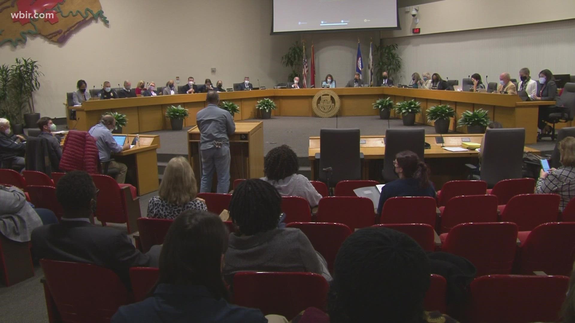 The city council voted to give police officers more overtime pay, after a controversial arrest of an activist and the death of a man in police custody.