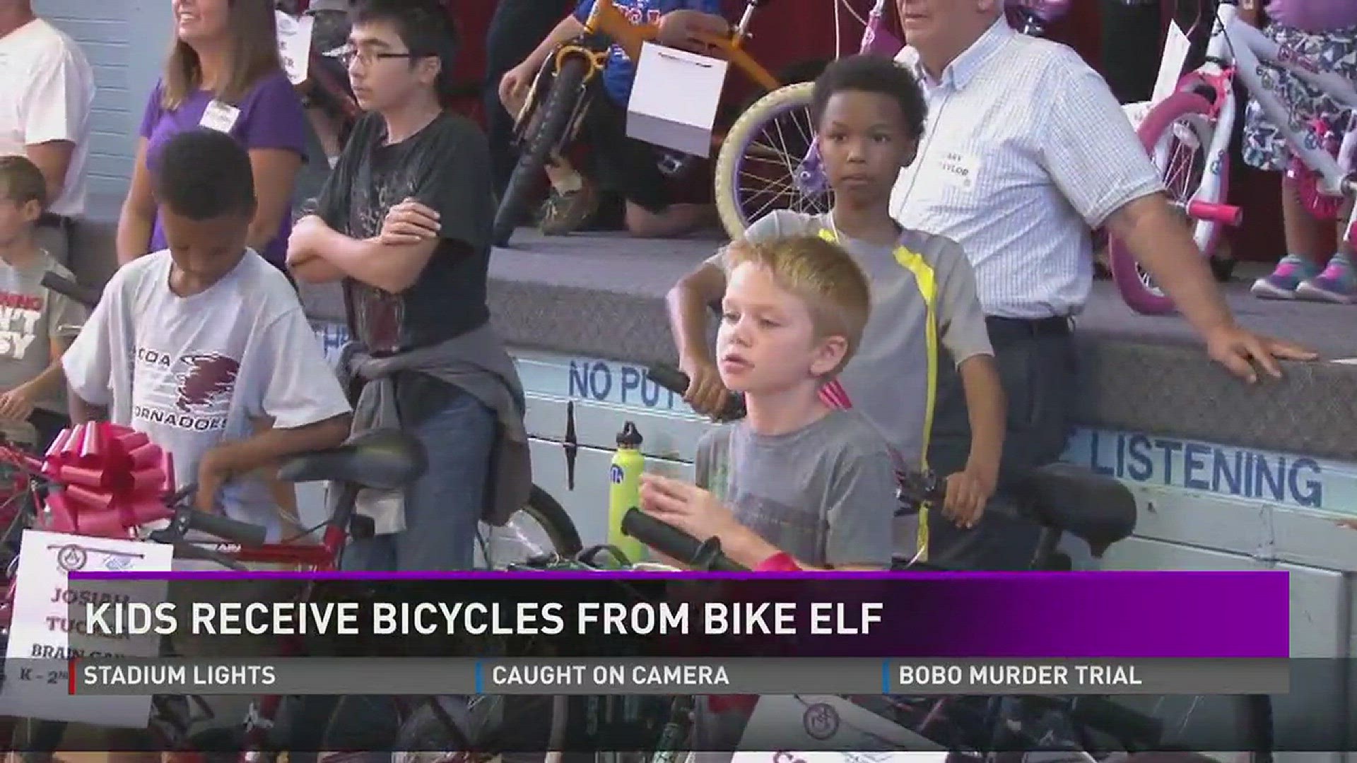 Kids receive bicycles from Bike Elf