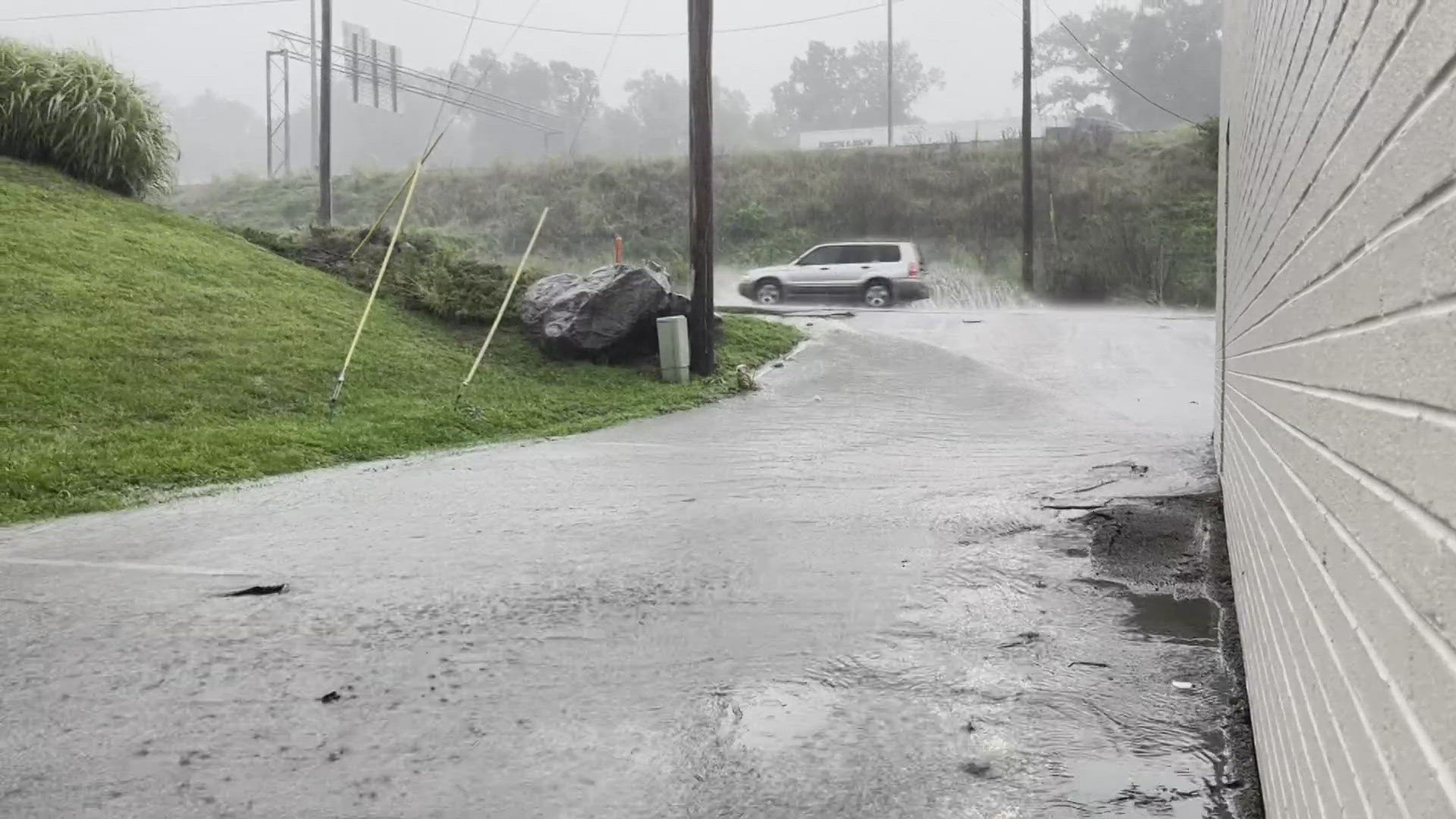 Papermill Drive in West Knoxville is flooded after thunderstorms on Tuesday afternoon.