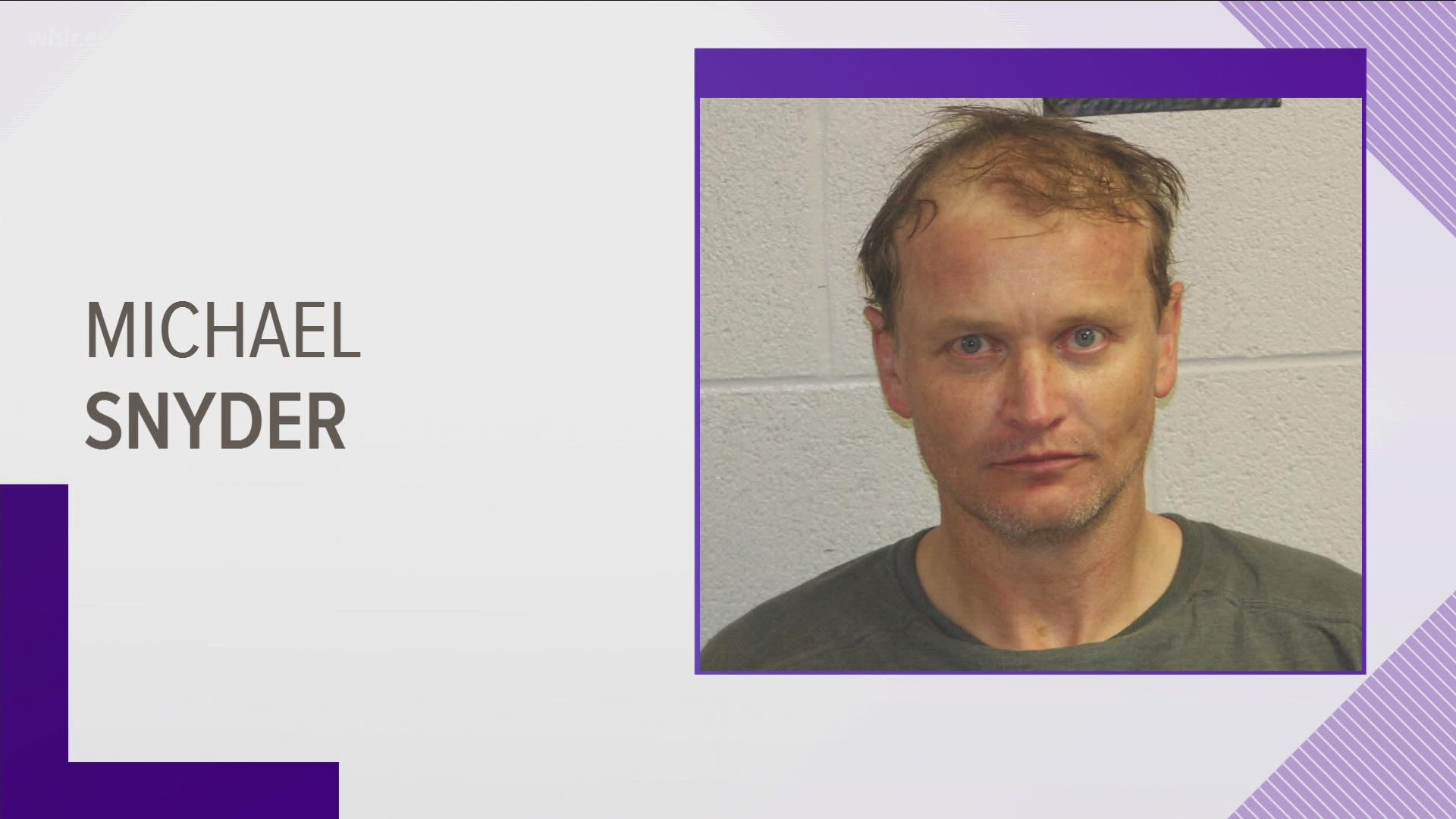 Deputies said they located Snyder in May 2020 in woods and discovered he had climbed a tree. Snyder reportedly fired a weapon at deputies.