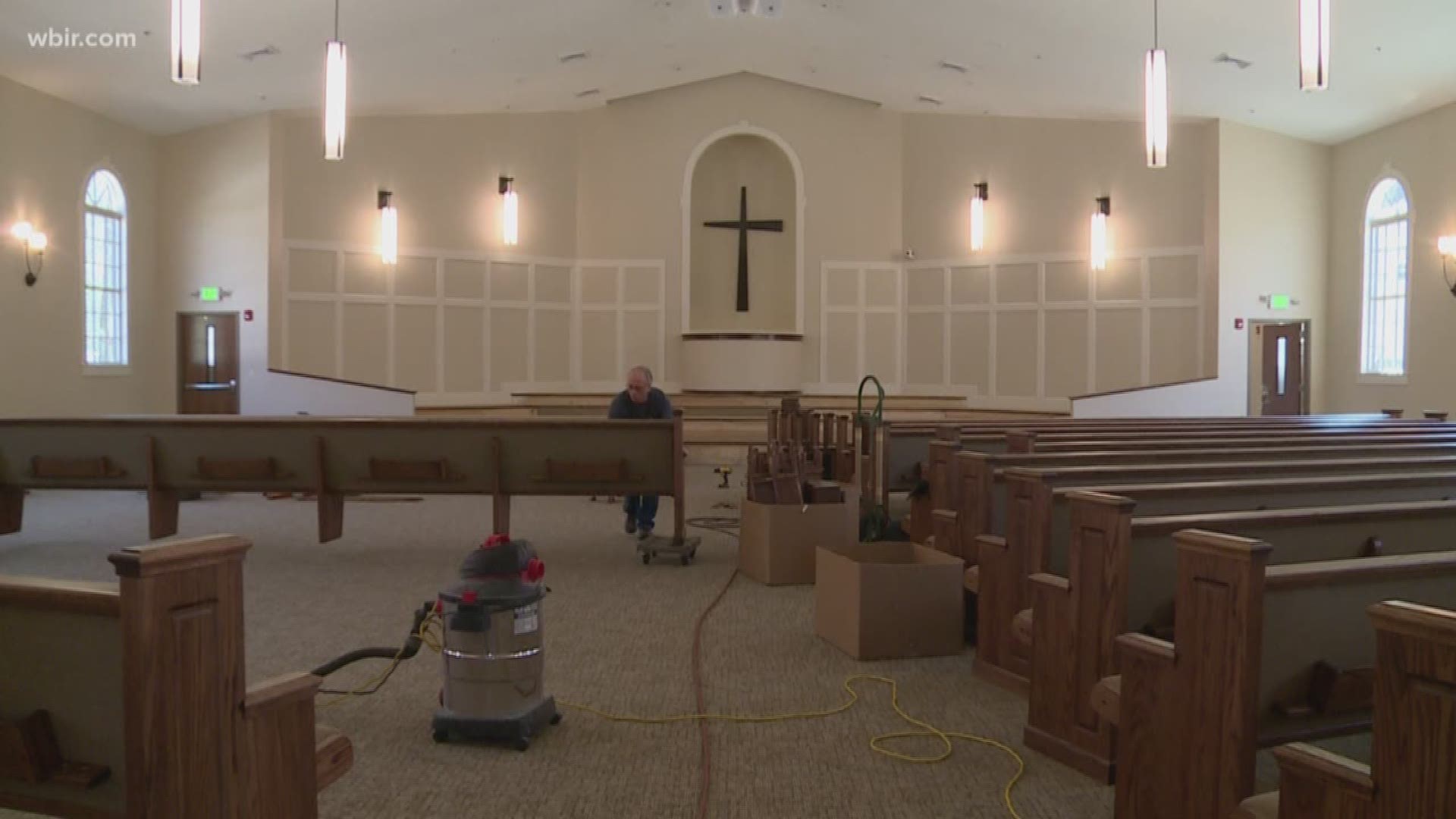 Roaring Fork Baptist Church was destroyed by fire in November 2016. Workers installed the pews in the almost completed building today. They  hope to be open this spring.