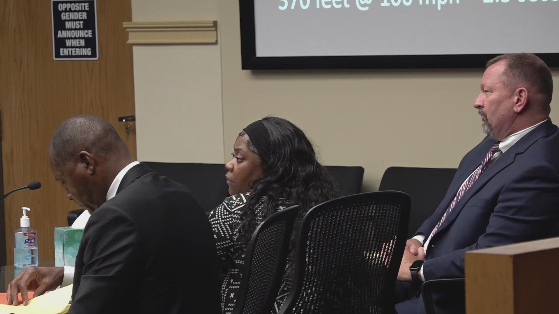 Trinity Clark is accused of drag racing and crashing into another car, killing a man and injuring his two grandchildren. 