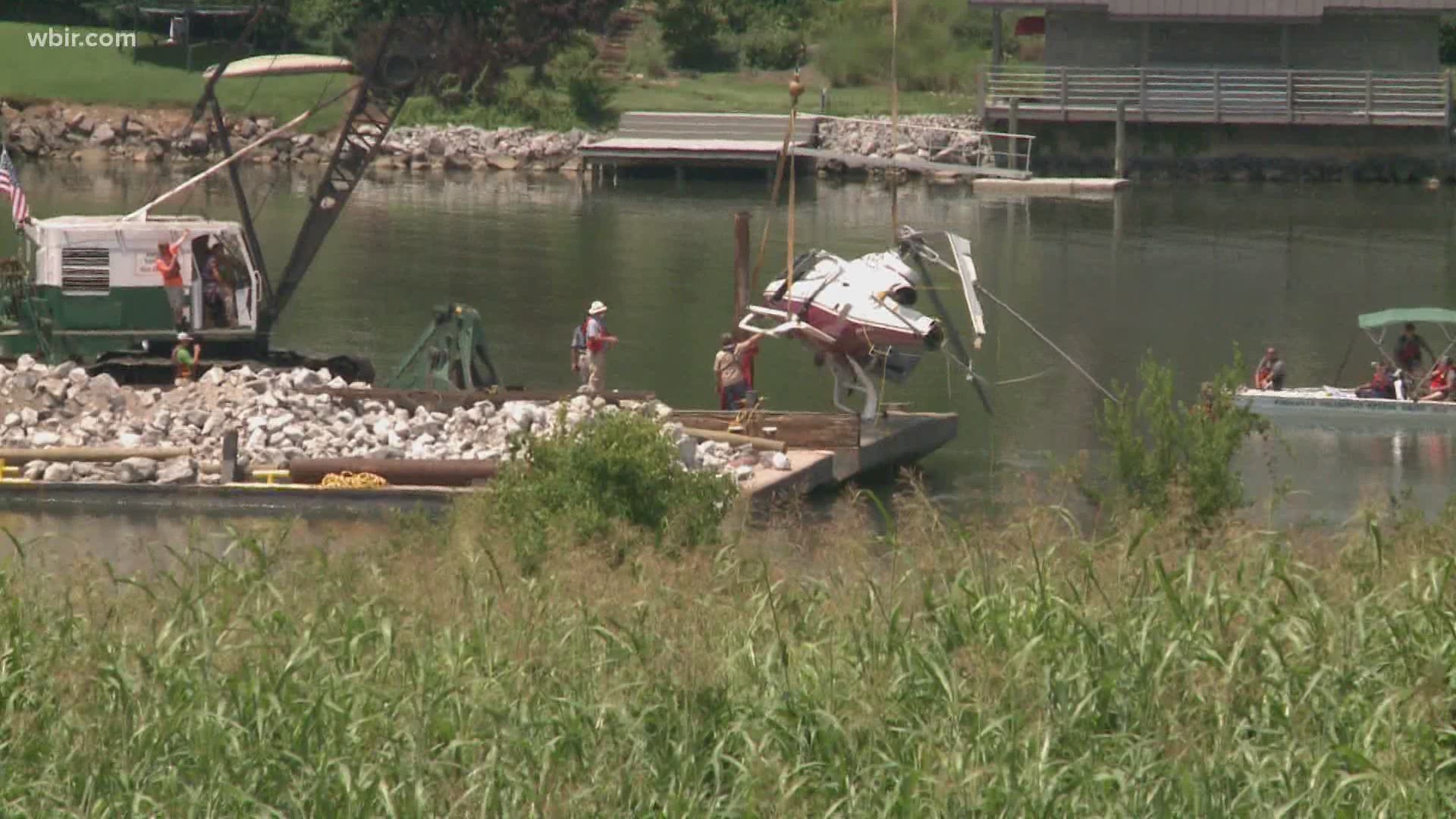 Crews removed a crashed helicopter from the Tennessee river.