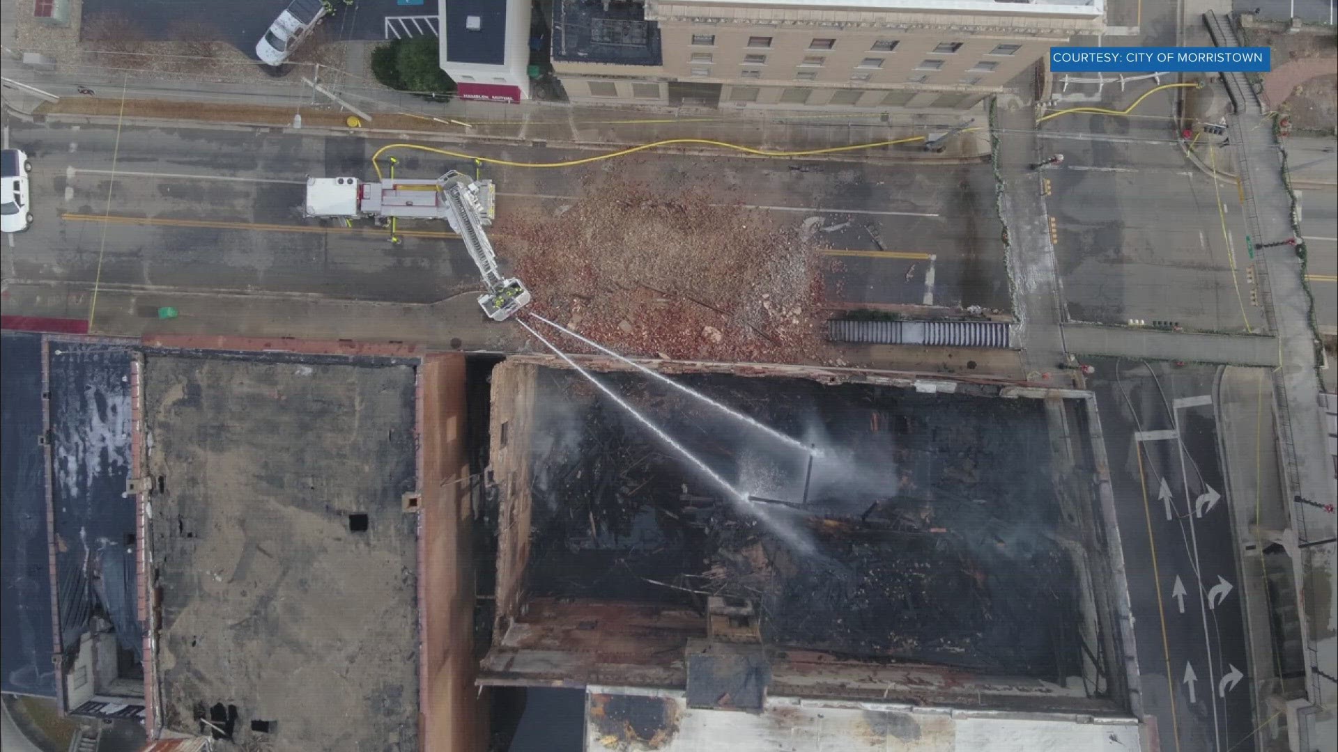 The historic Parks-Belk Building was burned down, and the roads near it were closed as crews worked to clean up after the blaze.