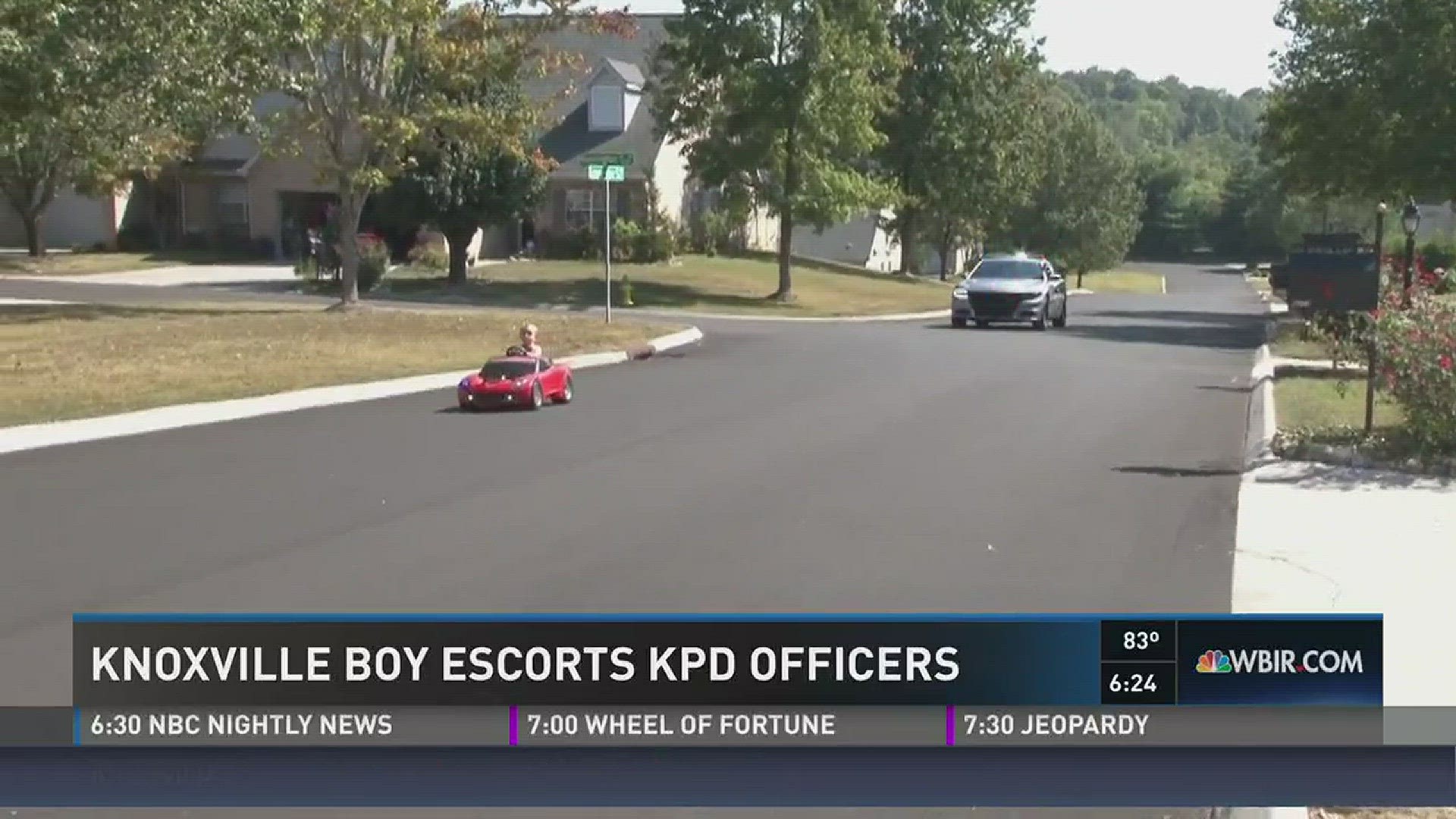 Knoxville boy escorts KPD officers