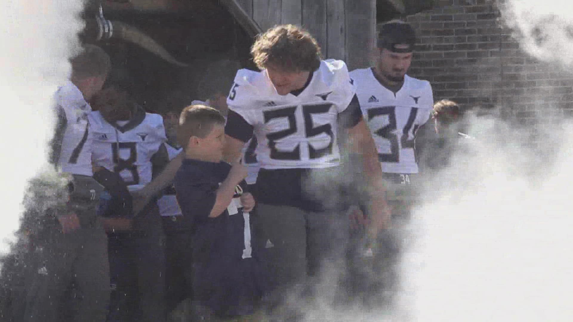 Anderson County football players host camp for young students | wbir.com