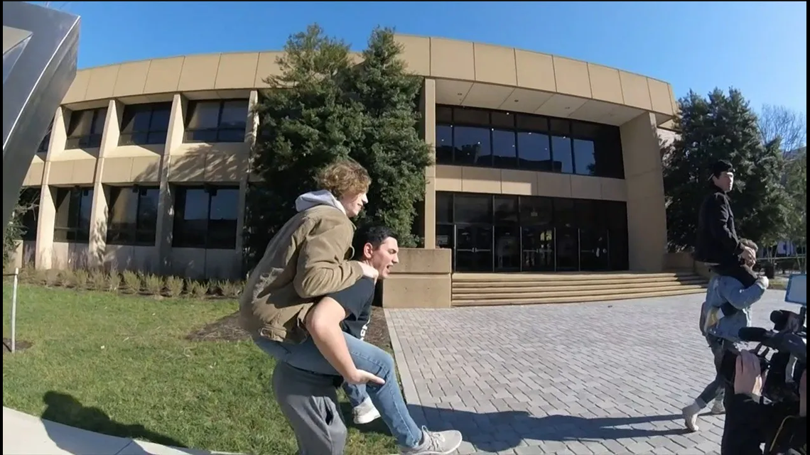 UTC men offer piggyback rides across campus for tips and giggles