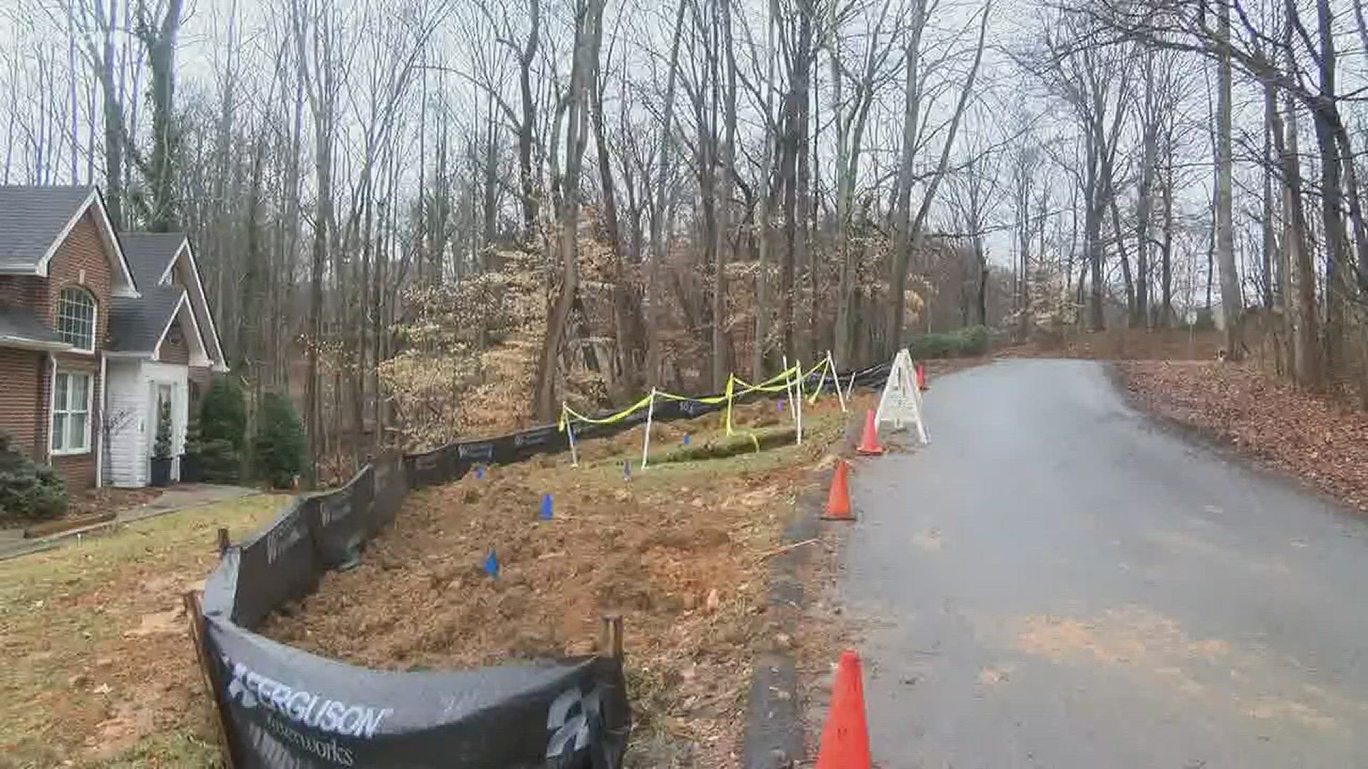 A sinkhole 20 feet deep and 15 feet wide swallowed a front yard in the town of Unicoi. Video from WCYB.