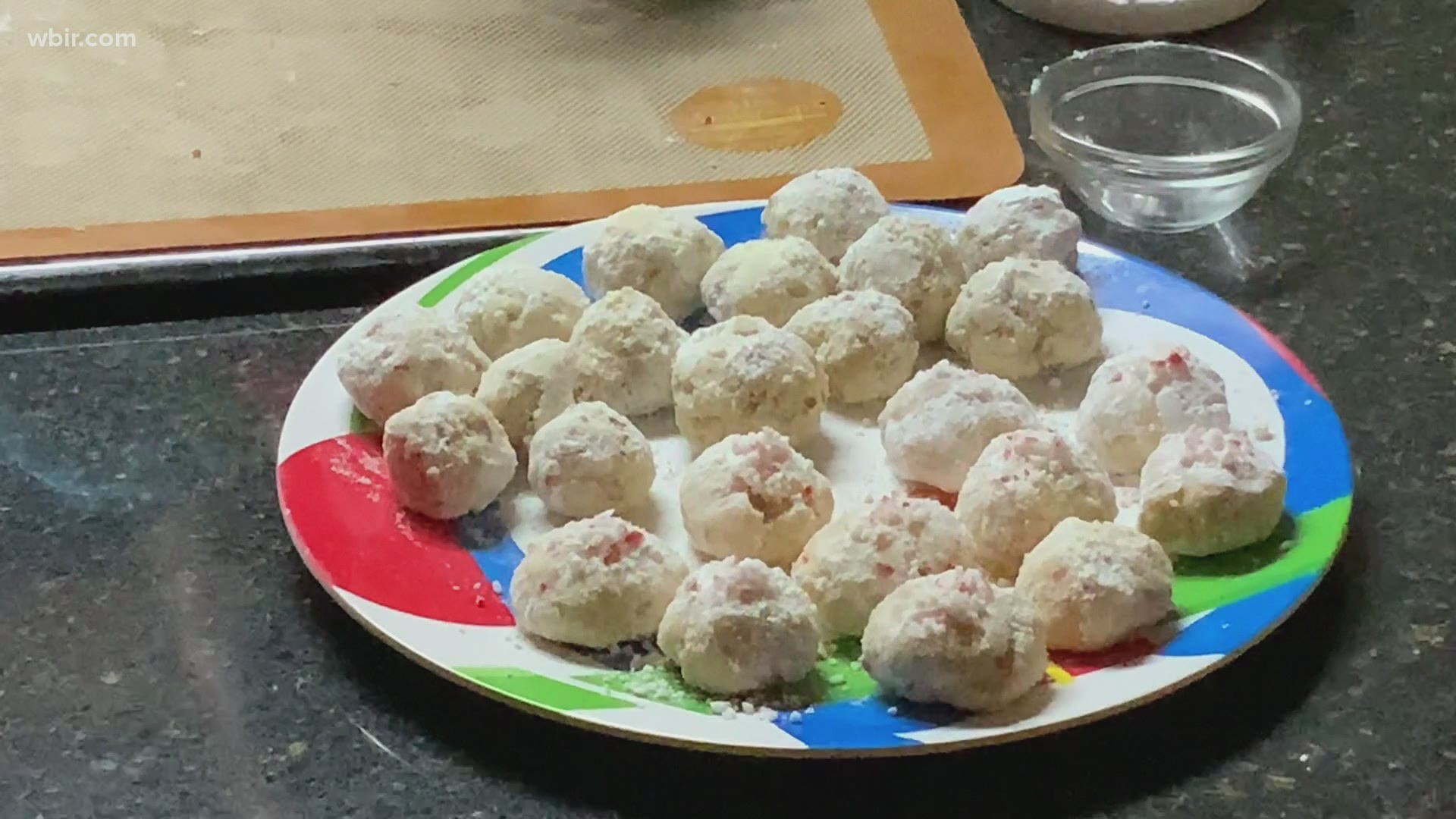 Terri Geiser with UT Culinary Institute shows how to make pecan nut balls.