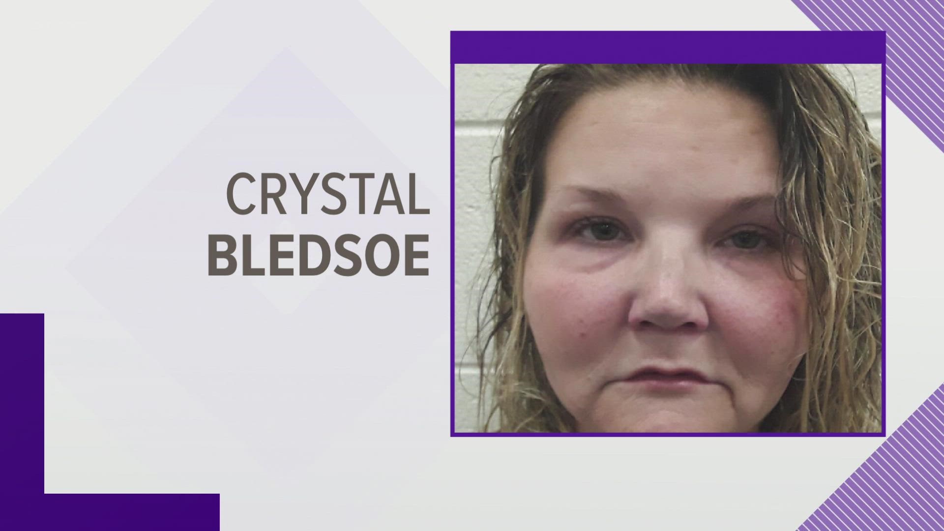 The arrest report said Bledsoe initially told deputies the boyfriend had been hit by a round that came from the woods behind her, but later admitted to shooting him.