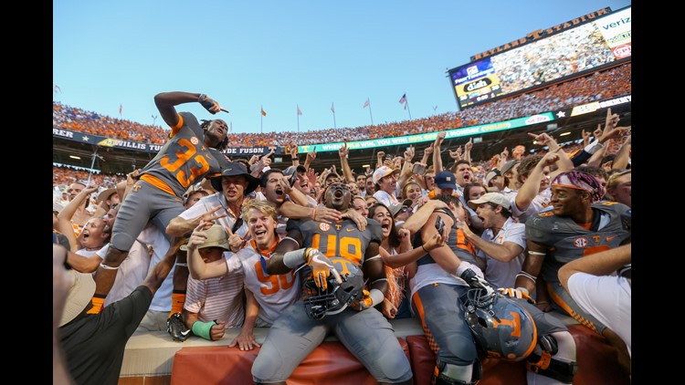 Record crowd watches No. 17 Vols beat Virginia Tech 45-24