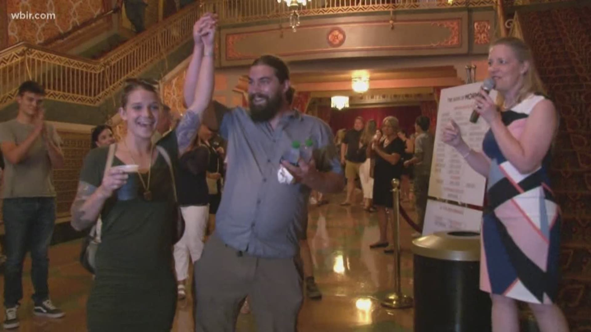 An Asheville couple went home with much more than a ticket stub from the Book of Mormon.