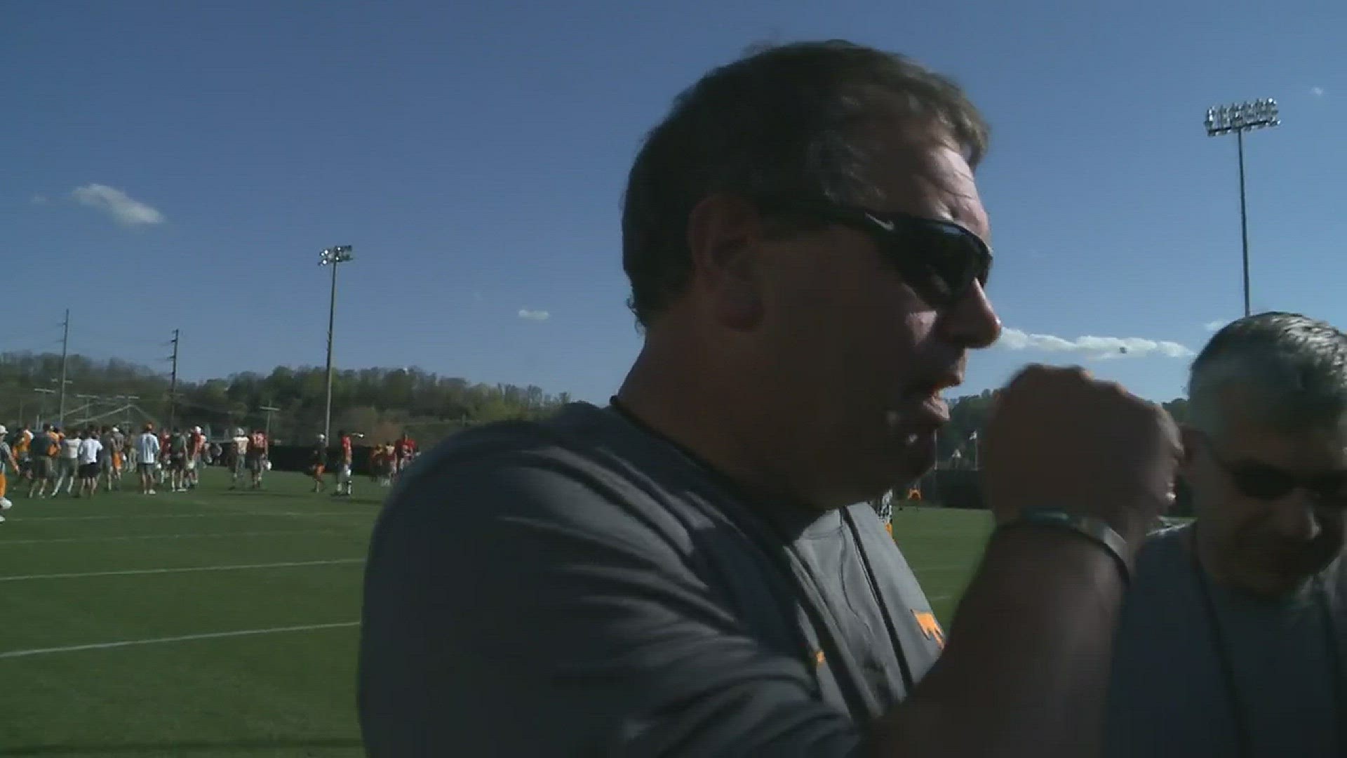 Tennessee defensive line coach Brady Hoke speaks to reporters after the Vols' spring football practice.