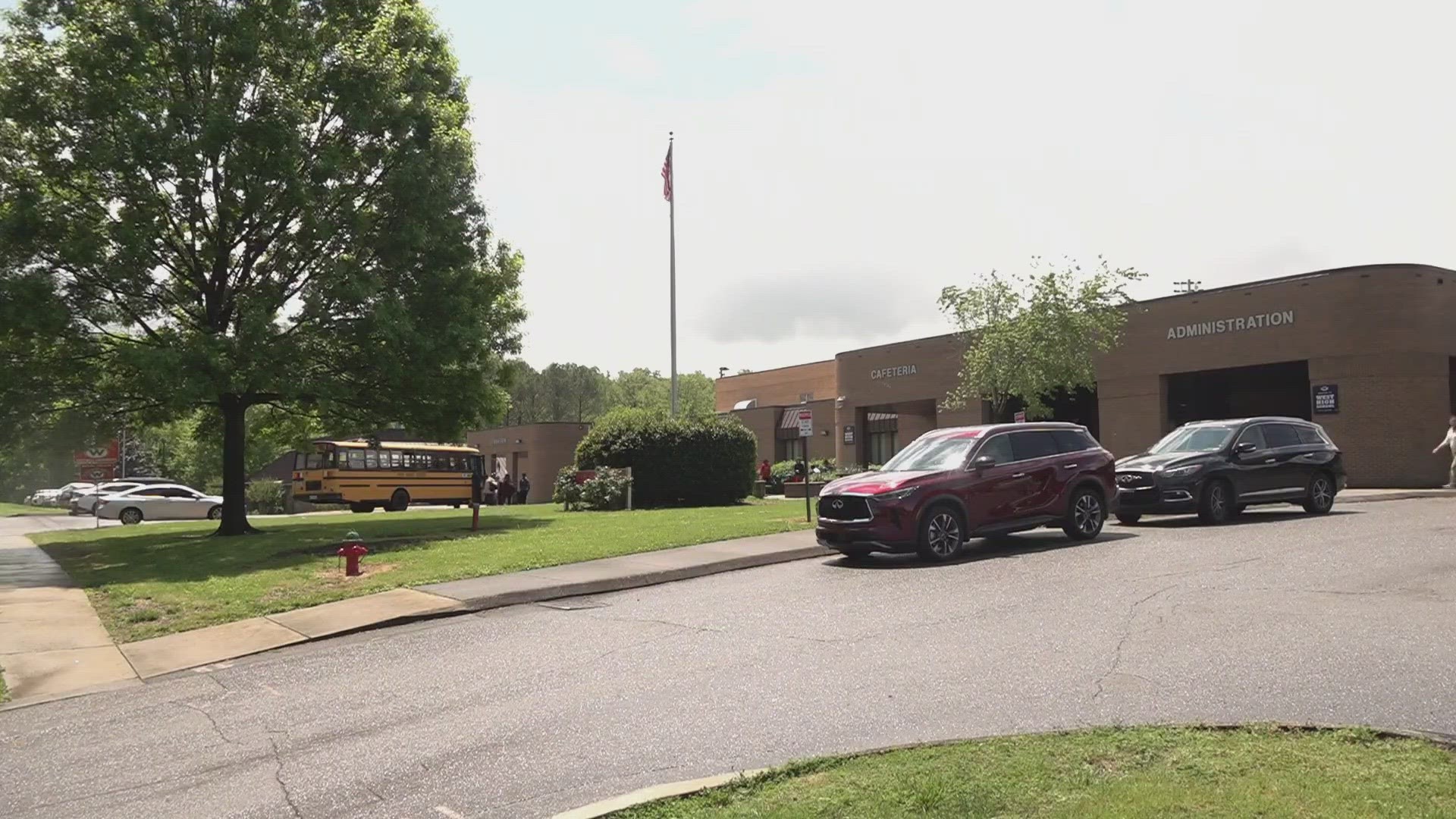KPD said a gun went off in a student's backpack, saying the teacher's wound was "very minor."