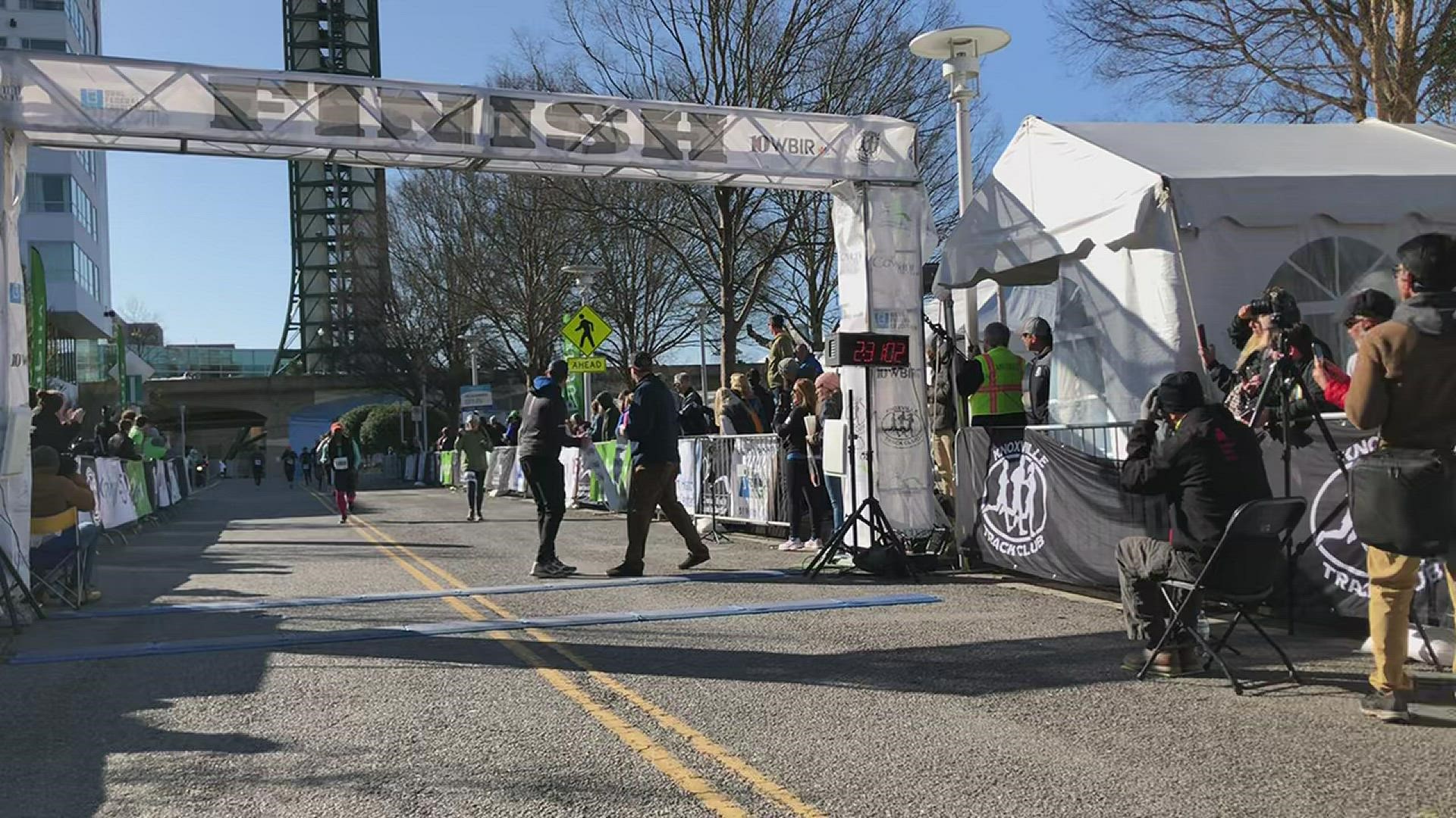 Ethan Coffey crossing the finish line after winning the Covenant Health Knoxville Marathon for the second year in a row.