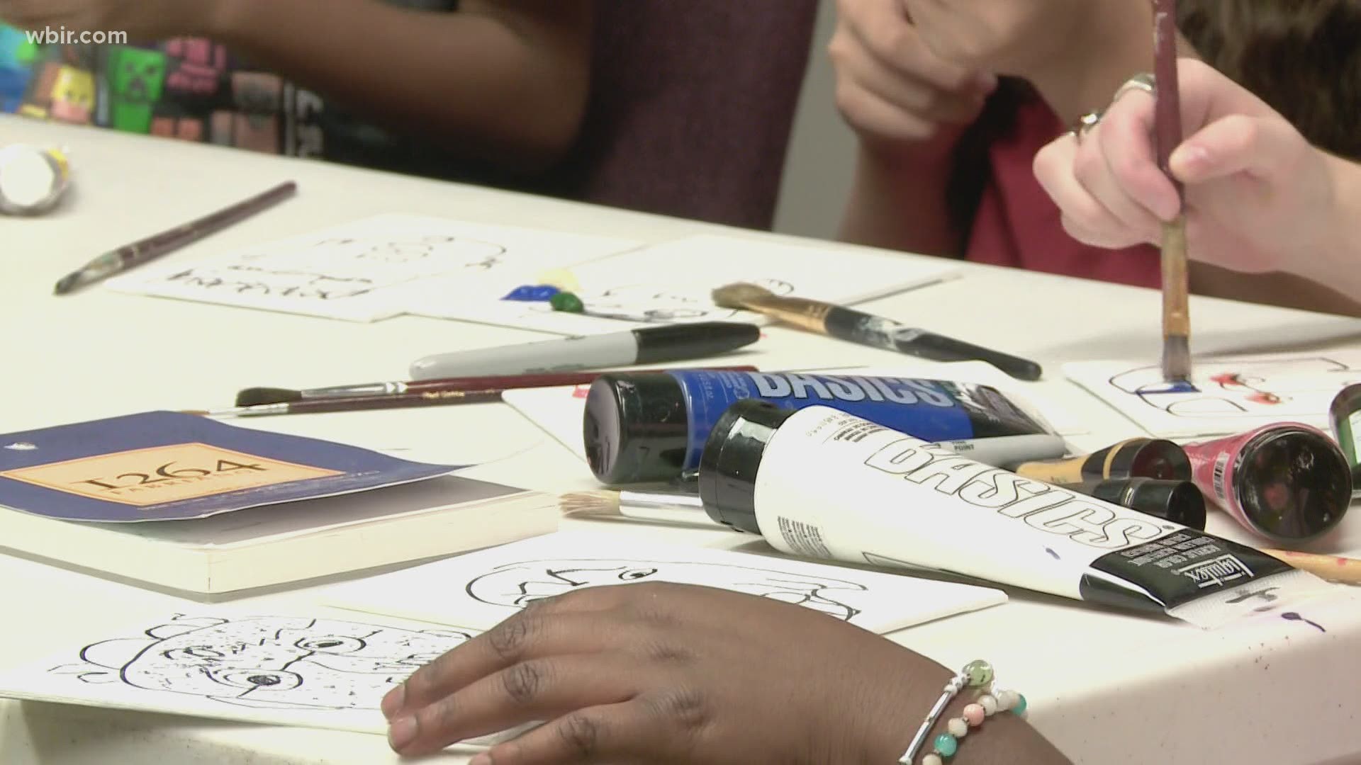Kids got hands-on with clay sculpting, painting, drawing and photography.