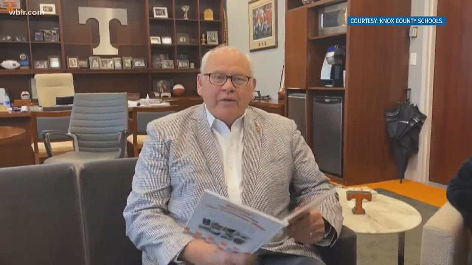 The school district posted the video of Coach Fulmer reading "Smokey's journey through the volunteer state" by Aimee Aryal.