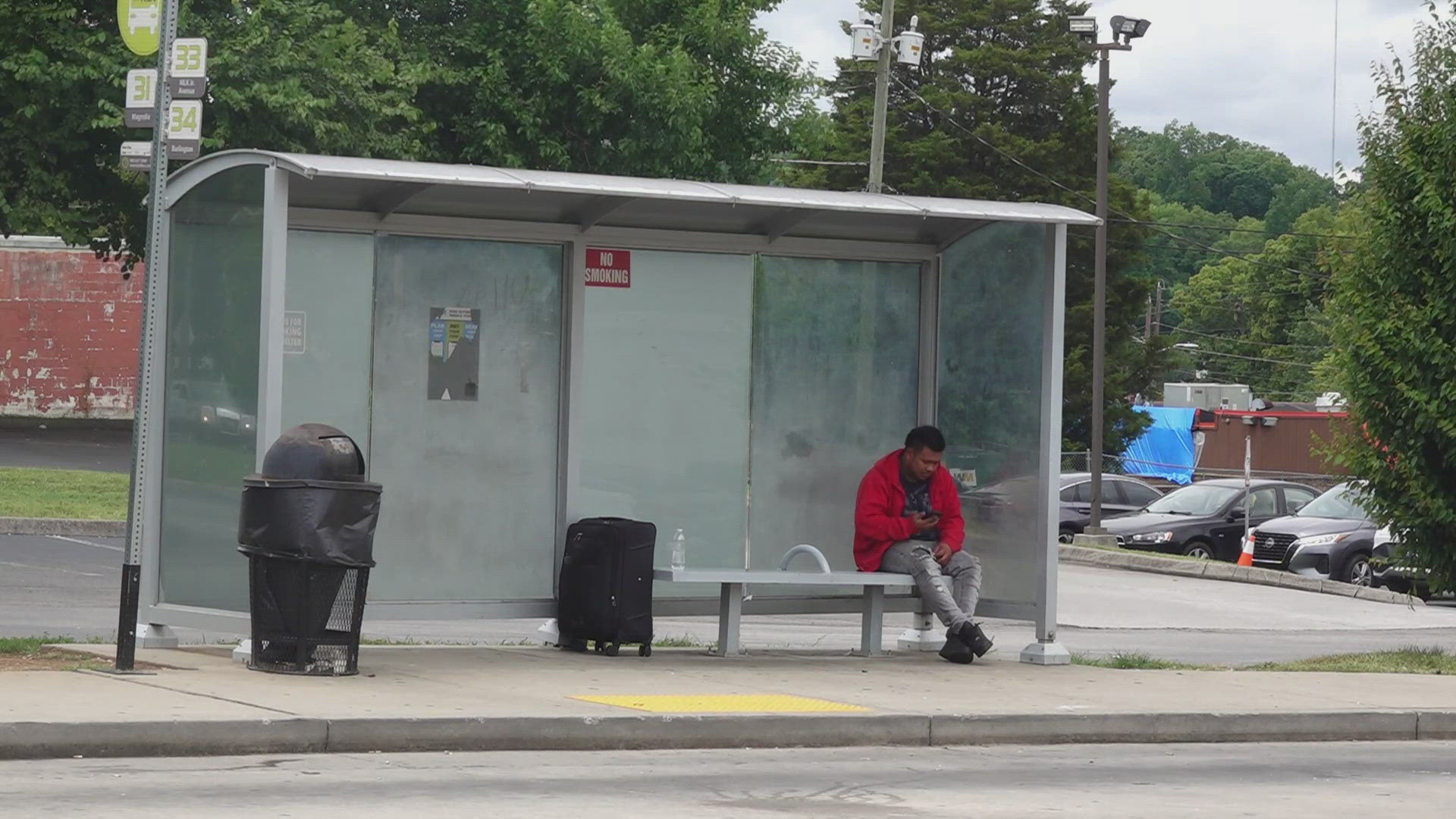 The Greyhound bus stop is located near a KAT bus stop — offering only a small shelter and a bench.