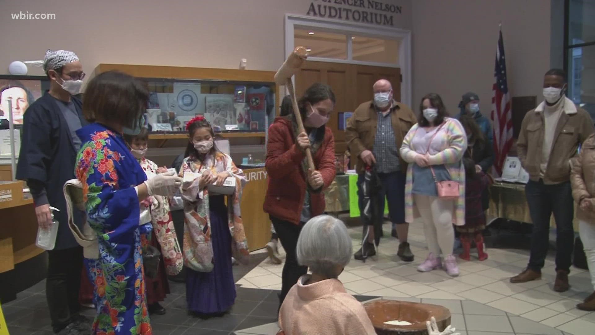 The festival included Japanese New Year traditions such as making sweet rice cake.