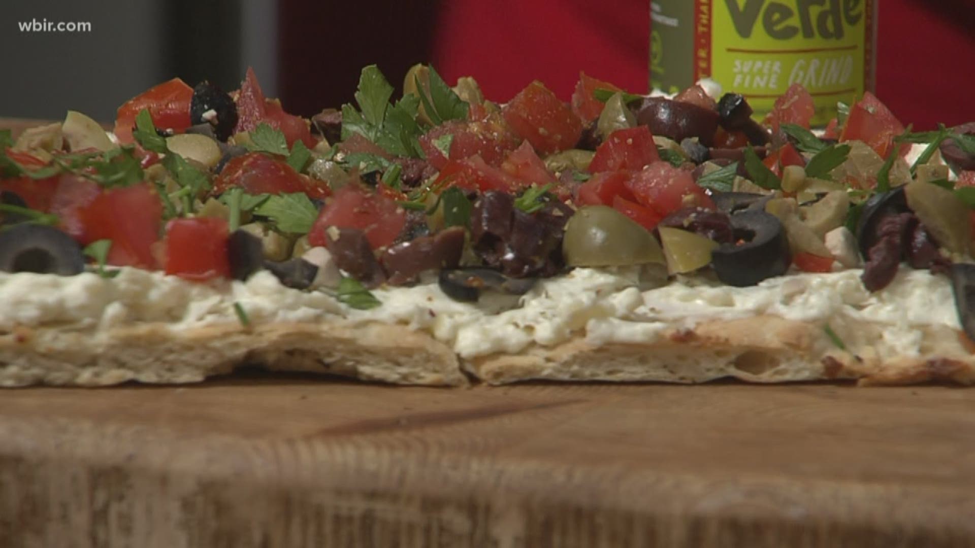 We are joined in the kitchen by Kim Wilcox from it's All So Yummy Cafe and Kim is going to show us how to make an olive pizza appetizer.