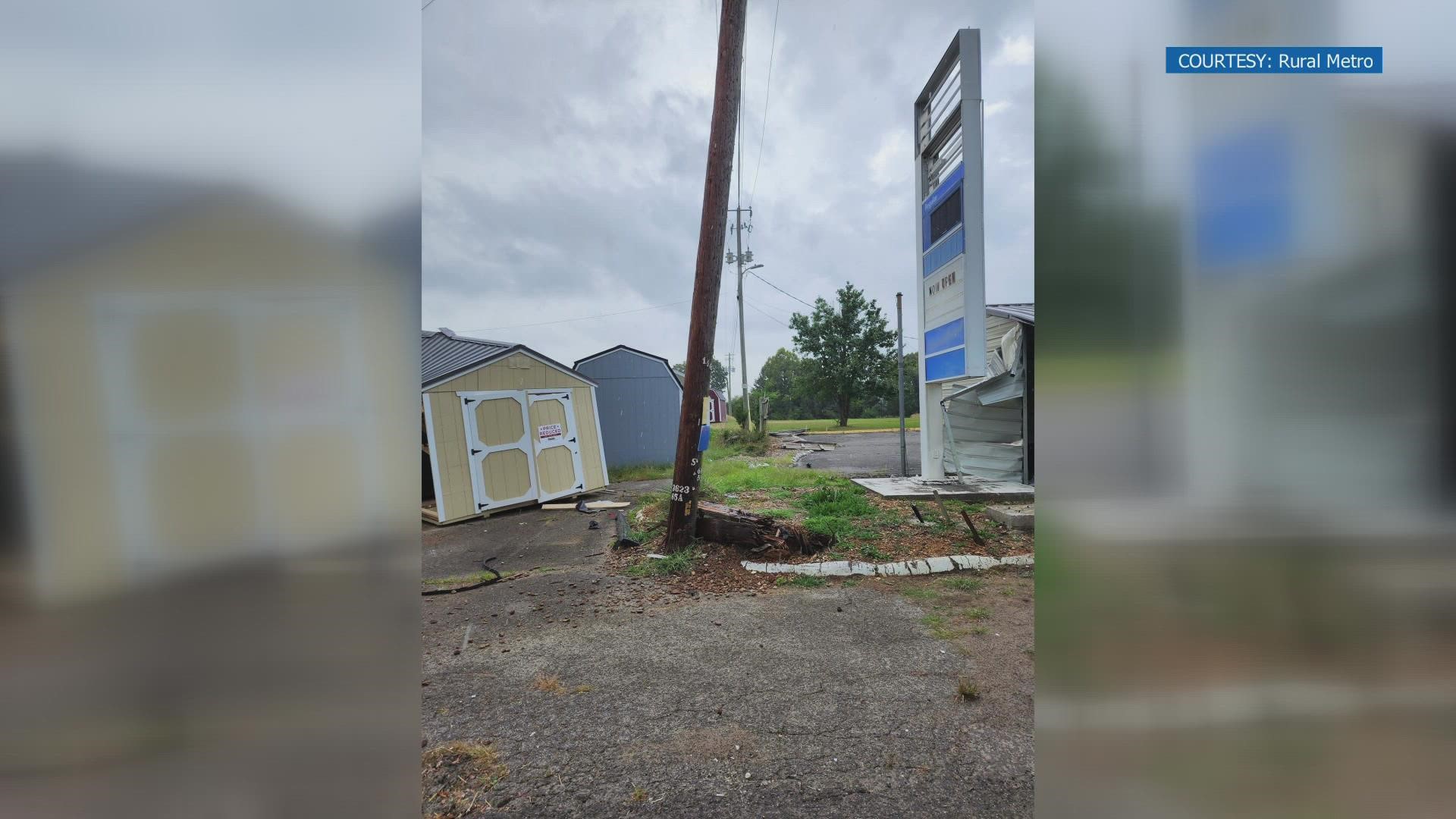 A car crashed into buildings near Clinton Highway and knocked down a power pole.