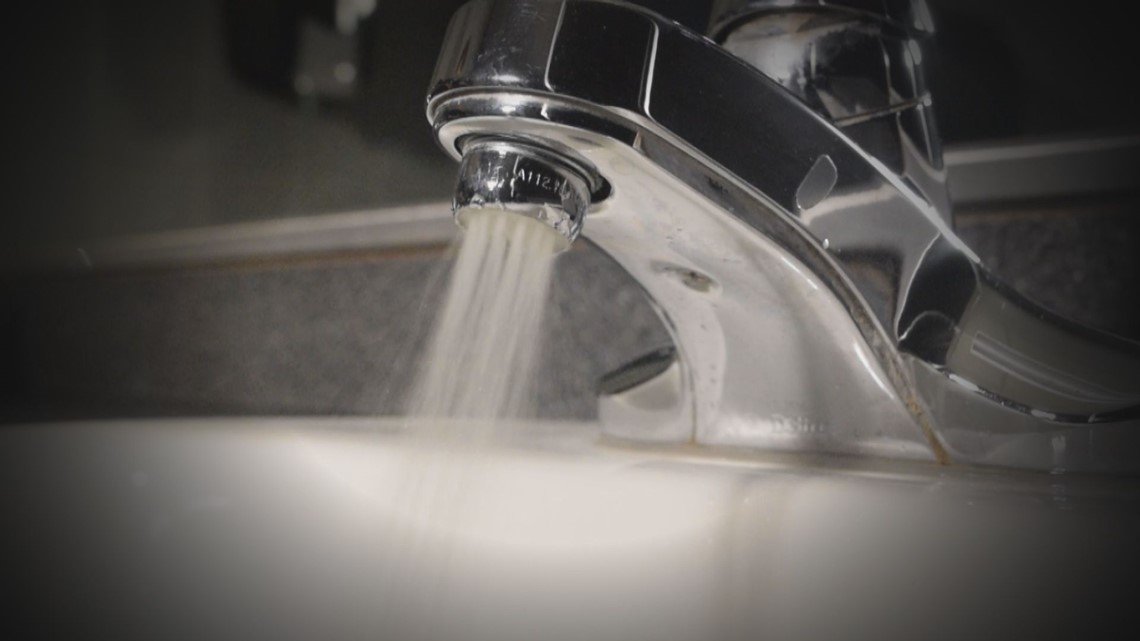 Water Quality Specialists show how to check well water after recent E