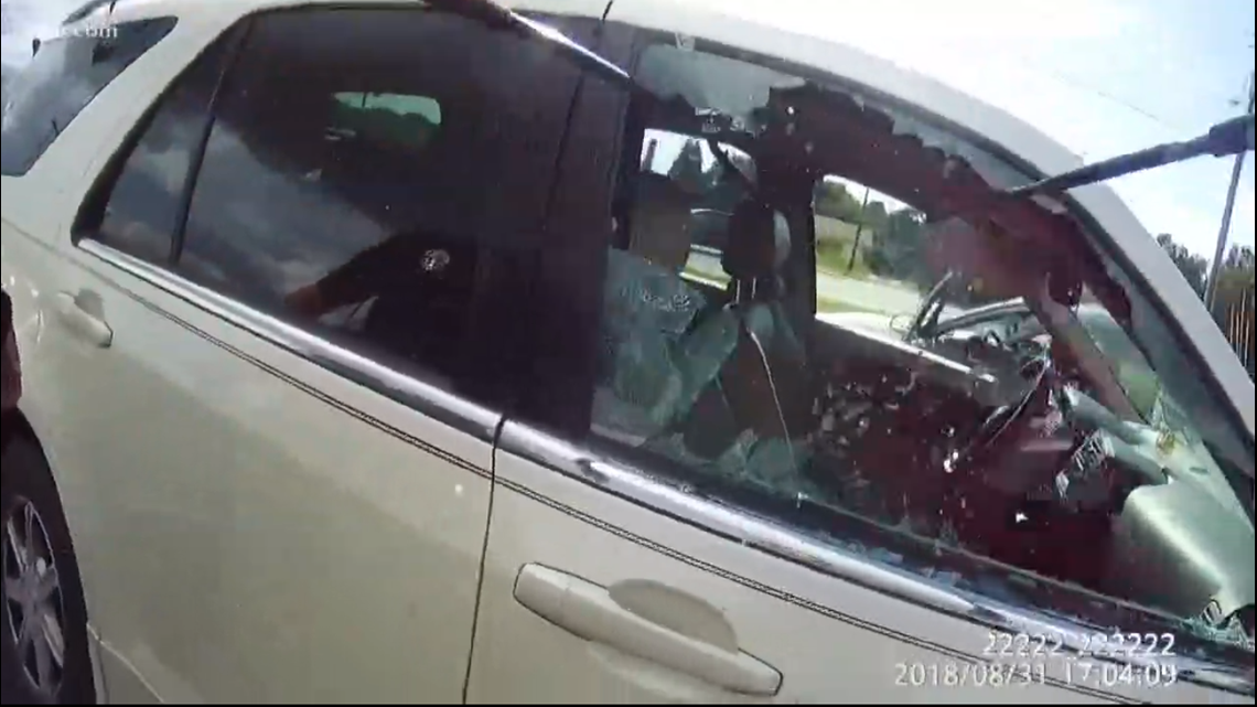 Watch: Police sergeant busts window to rescue teen trapped in hot car ...