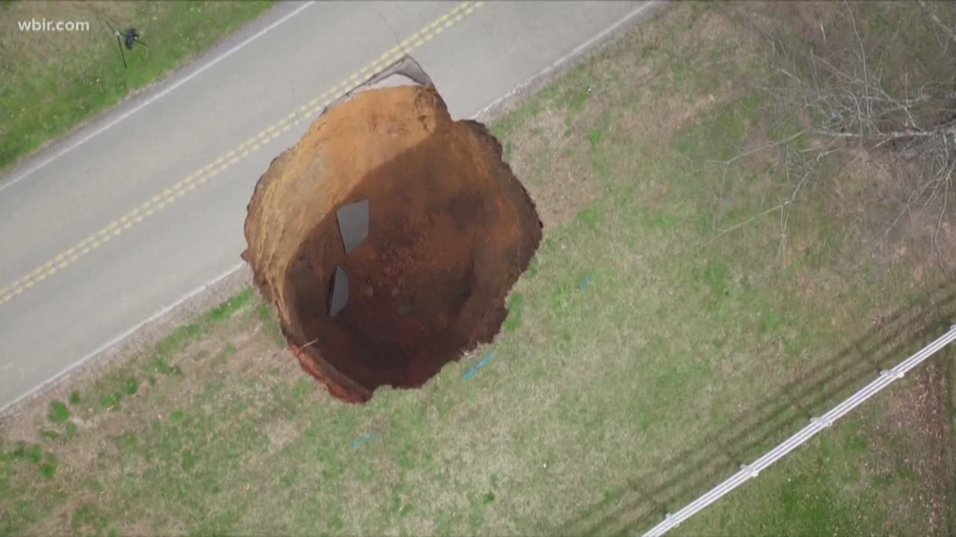 A giant sinkhole has taken out a road in North Knox County. The hole -- is 25-feet-wide and 60-feet-deep -- and still growing.