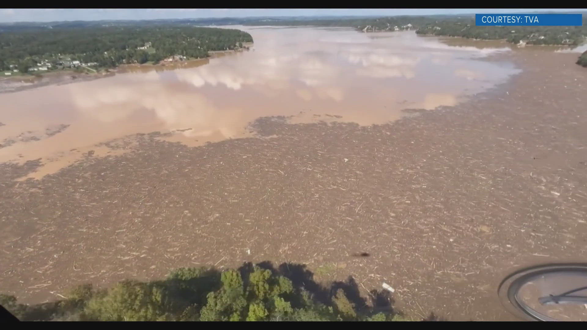 A boom is a floating barrier that captures surface and submerged debris in bodies of water, the Tennessee Valley Authority said.