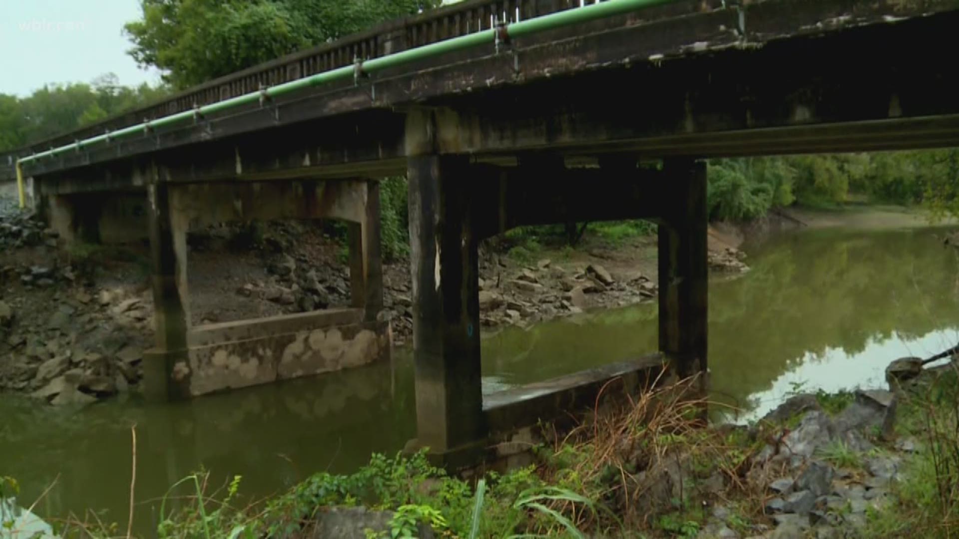 A Fed-Ex driver from Hawkins County says he saved a woman from jumping off a bridge earlier this week.